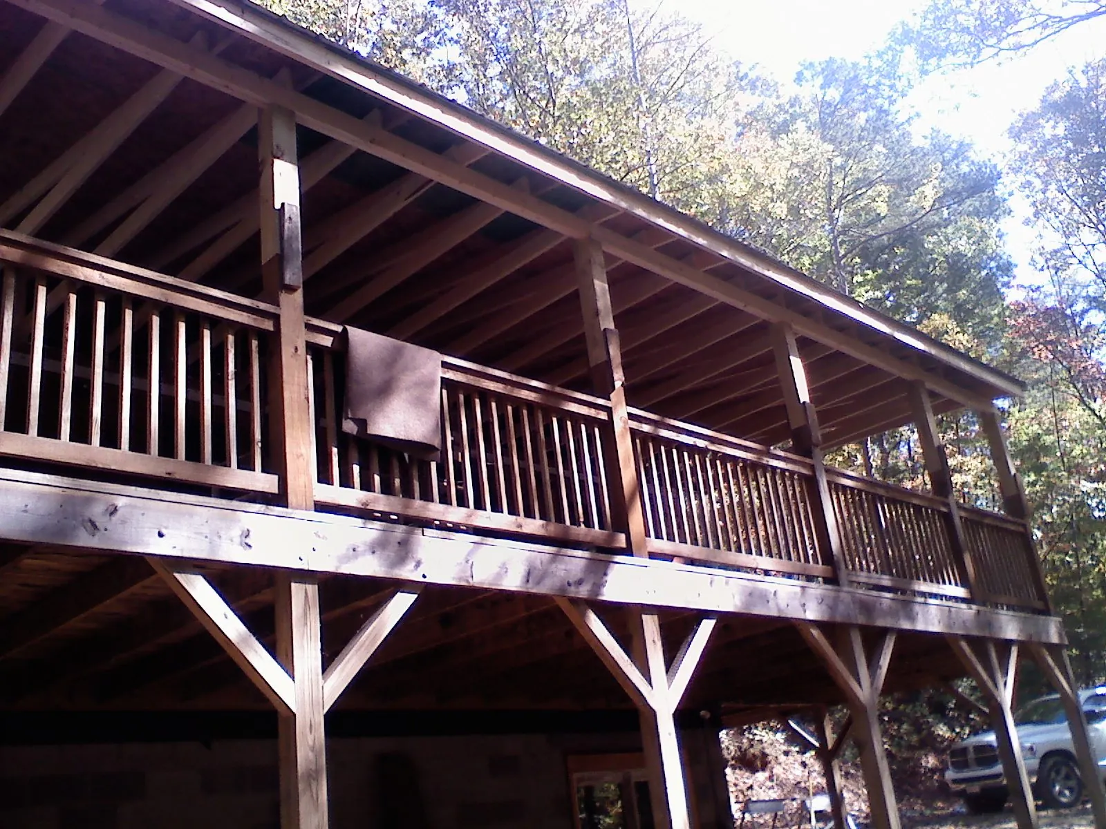 Timber framing under a new elevated porch and deck — Roof Leak Repair in Noxon by Roofing Brothers